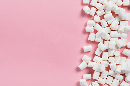 Marshmallows on pink background with copyspace featuring marshmallow, pink, a Food & Drink Photo by Fascinadora