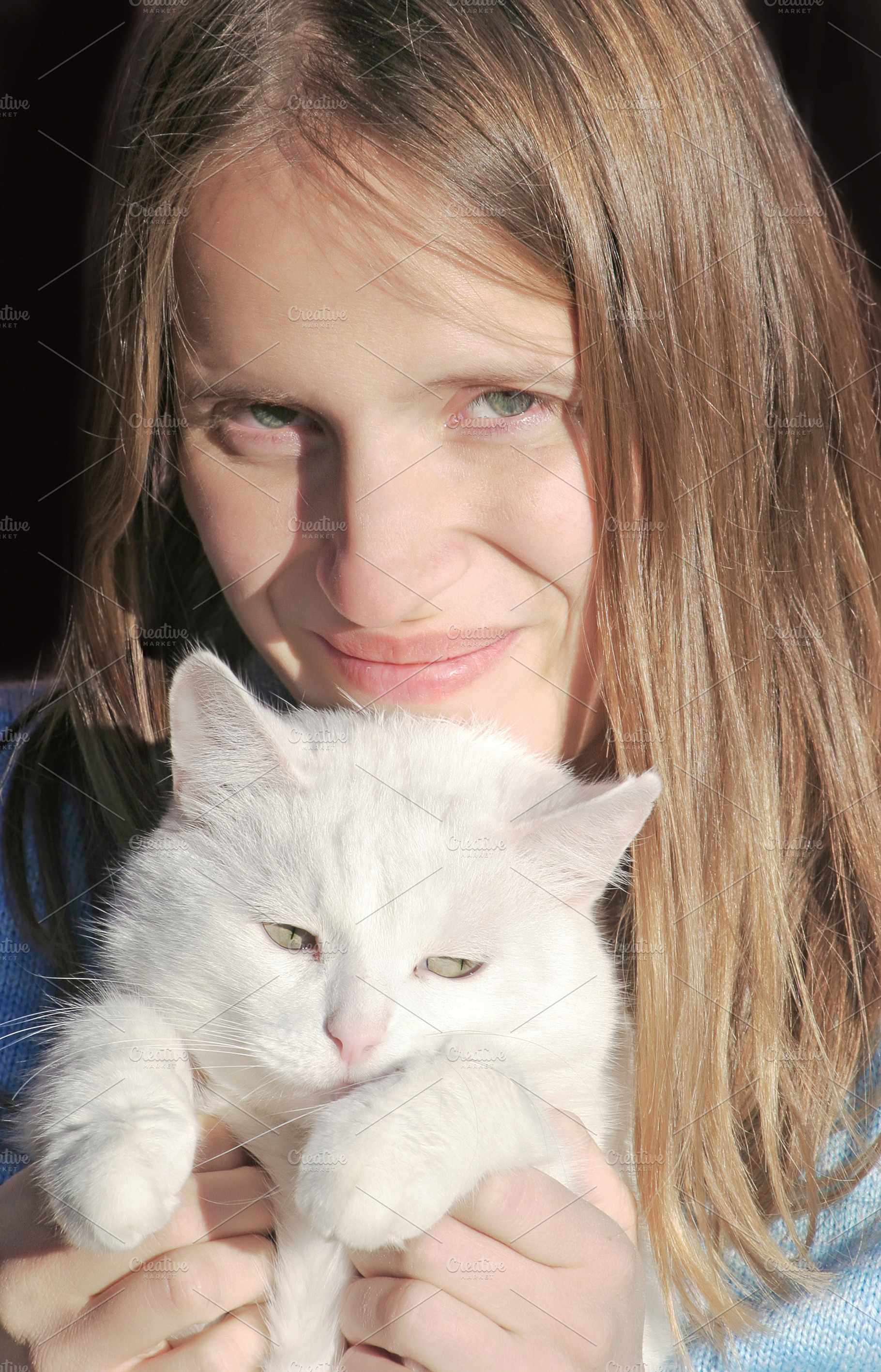 Young woman with cat, a Photo by saiko3p