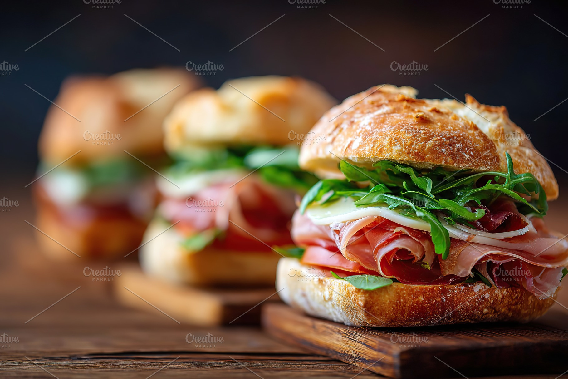 Delicious ciabatta rolls with layers of greens, prosciutto, and tomatoes ready, a Food & Drink Photo by AlyaAnd