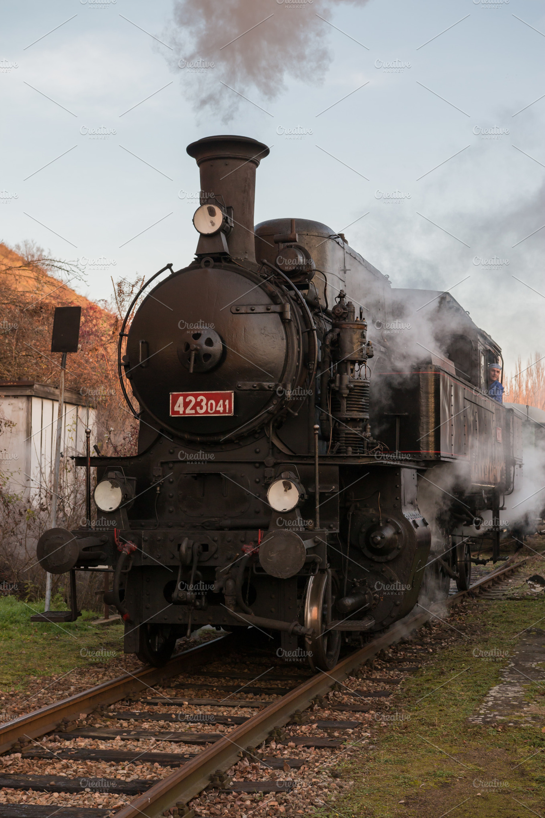 Steam train at the station stock photo containing locomotive and smoke, an Industrial Photo by Tomas Luka