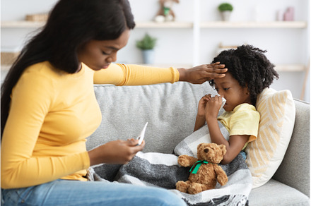 Flu Concept. African American Mother, a Person Photo by Prostock-Studio