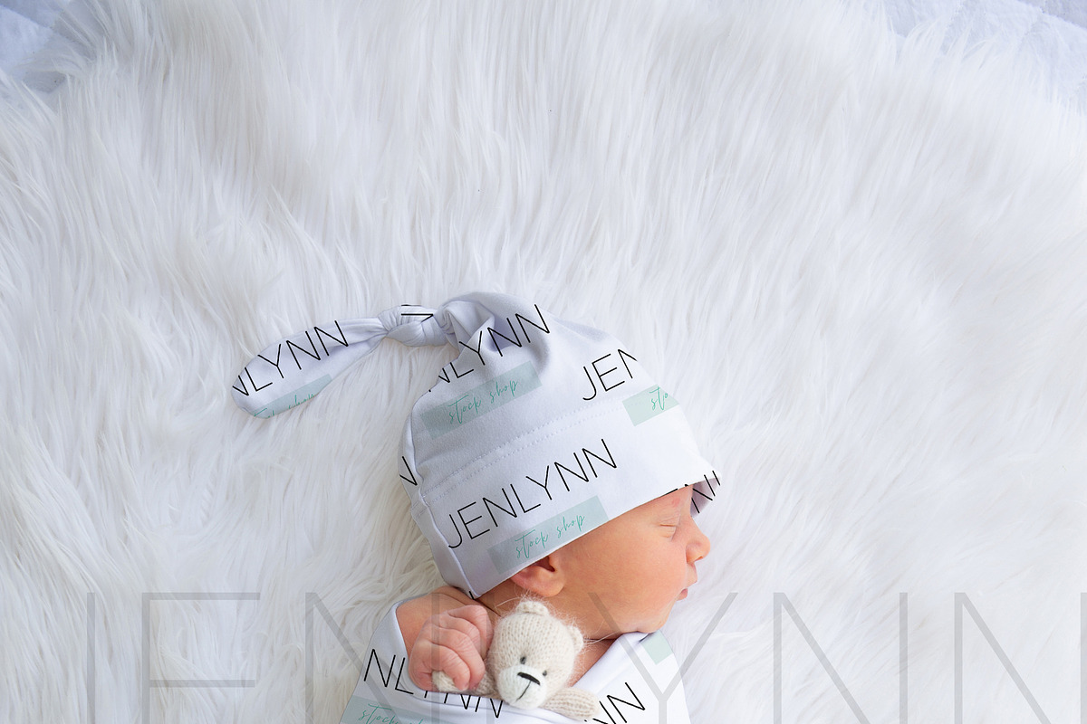 Swaddle blanket + Knotted Hat mockup, a Hat Mockup by JENLYNN Stock Shop (Photo 1 of 5)