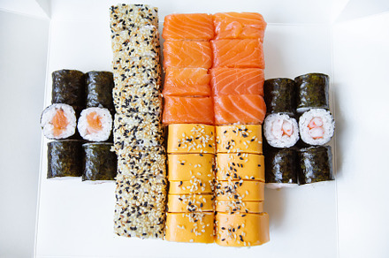 Sushi from Japanese cuisine. There are different types of sushi in the box. Del, a Food & Drink Photo by Artsaba Family