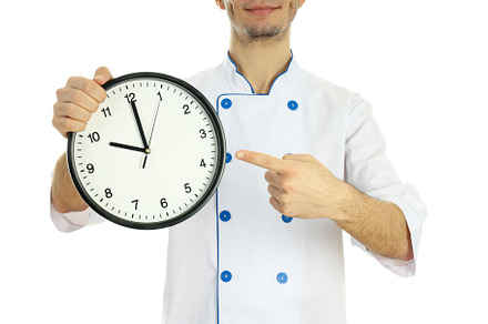 Concept of cooking, chef with clock isolated on white background, a Person Photo by AtlasStudio PRO