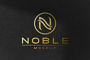 Gold Foil Logo Mockup on Black Paper, a Product Mockup by Smart Works (Thumbnail 1 of 2)