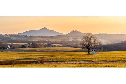 Hilly landscape illuminated by stock photo containing landscape and grass, a Nature Photo by pytyczech