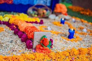 Flower cross with candles and