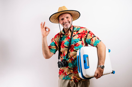 Smiling man ready for tropical vacation adventure
