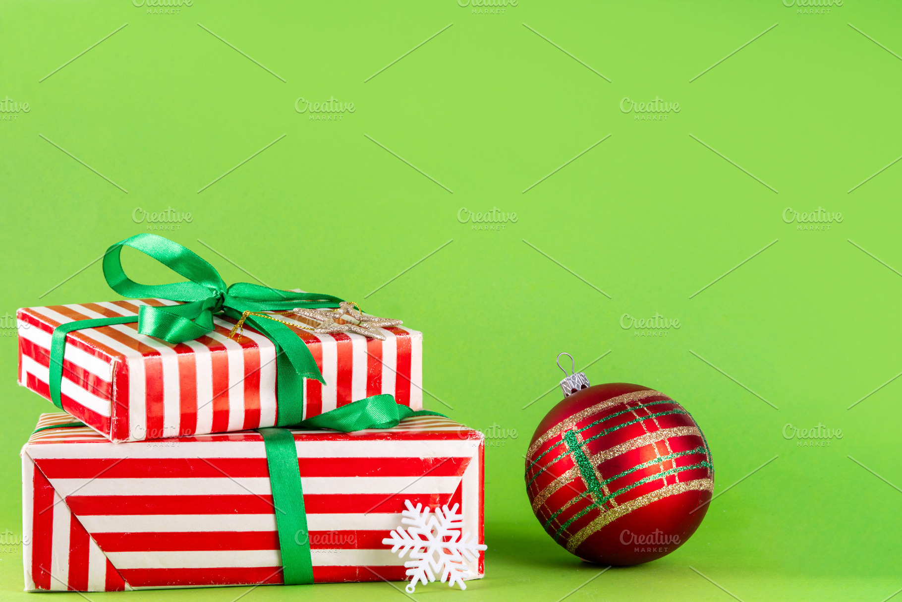 Bright high-colored background with Christmas boxes, festive bau, a Holiday Photo by Rimma