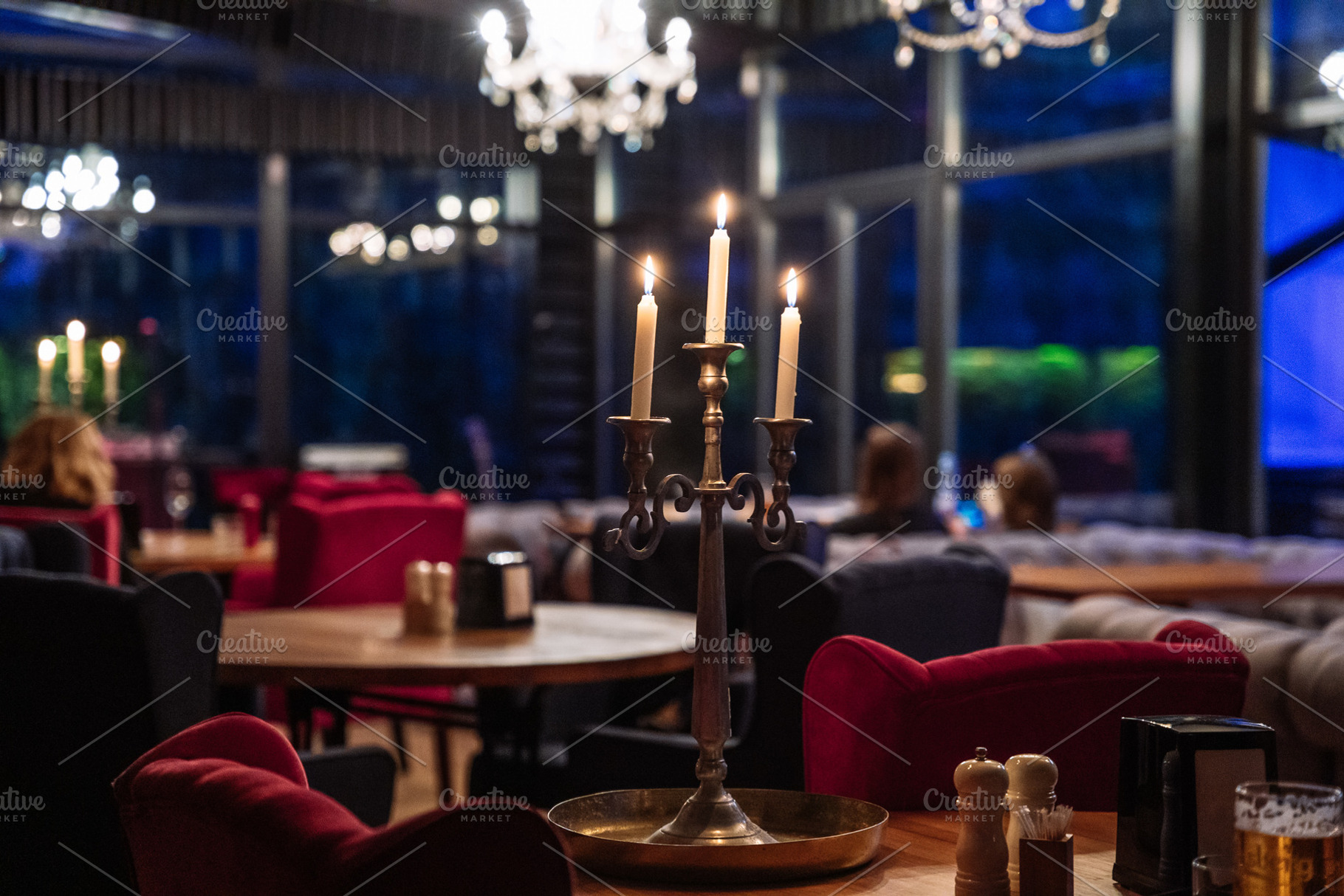Elegant Restaurant Interior with Candlelight and Cozy Evening Atmosphere, a Background Photo by Red Hot Chili Pepper Shop