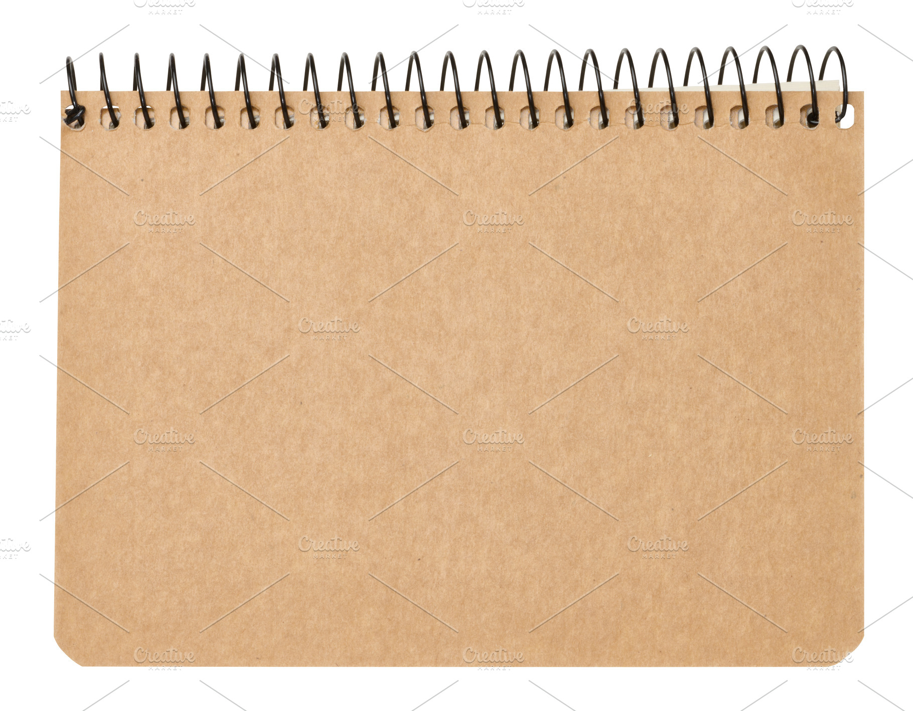 Kraft paper spiral notebook, isolated background, a School & Education Photo by ndanko