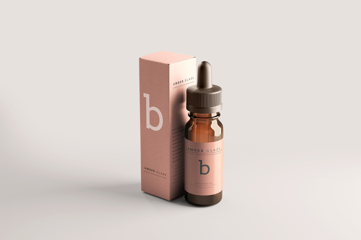 Amber Glass Dropper Bottle Mockups, a Cups & Container Mockup by pmvch (Photo 1 of 20)