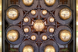 Circular chandelier with lit candles from below, an Arts & Entertainment Photo by DanFLCreativo