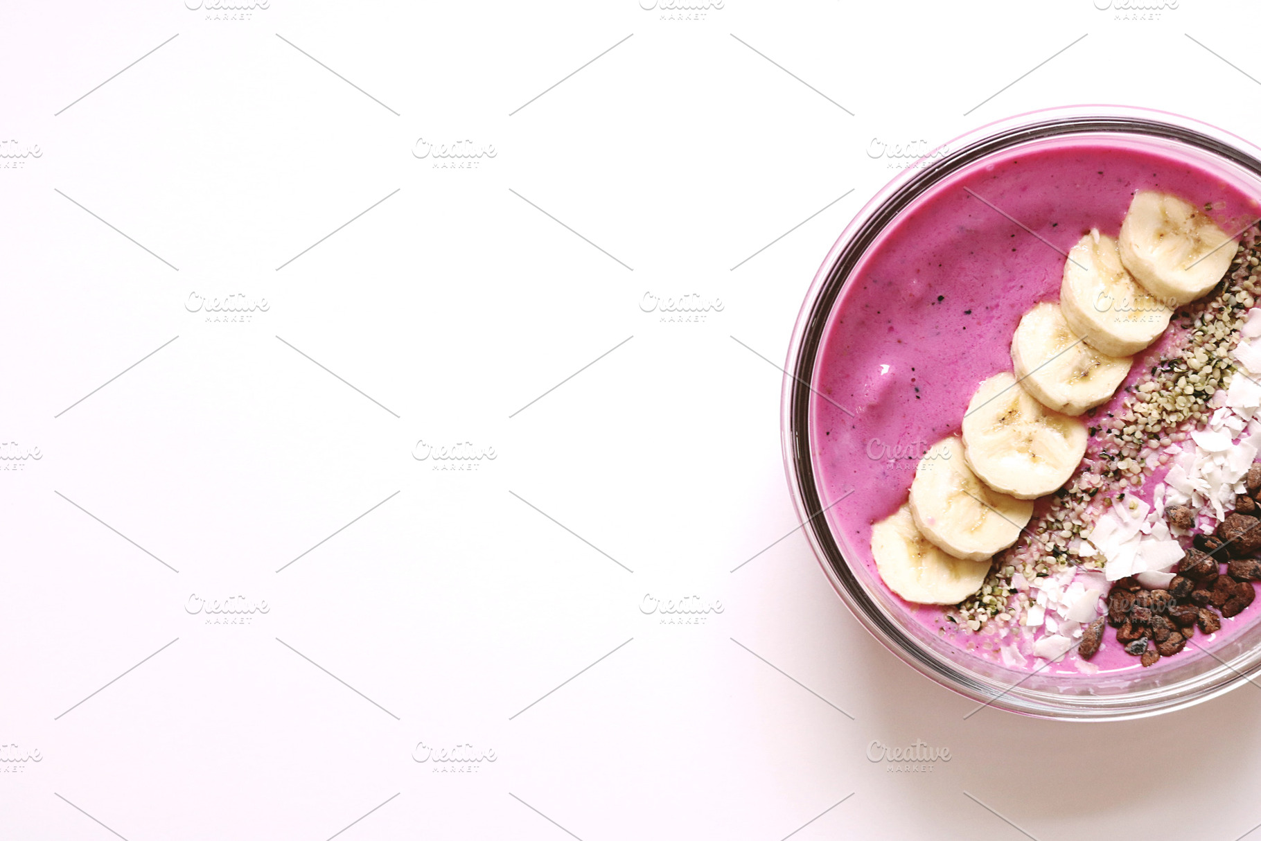 Close up of smoothie bowl on white stock photo containing smoothie and, a Food & Drink Photo by MDSN Design