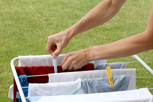 Woman hands and laundry, a Person Photo by BOOCYS