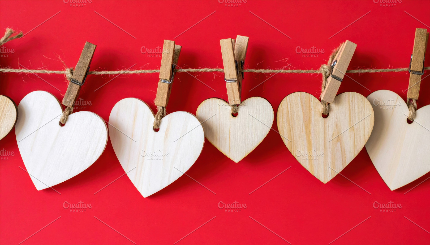 Wooden Hearts Hanging on Rustic Rope, a Holiday Photo by Davizro's Market