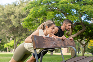 Athletic Couple Doing Incline Push Ups on a Park Bench, a Sports & Recreation Photo by etorres69