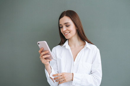 Portrait of young woman with mobile, a Person Photo by Galina_Zhigalova