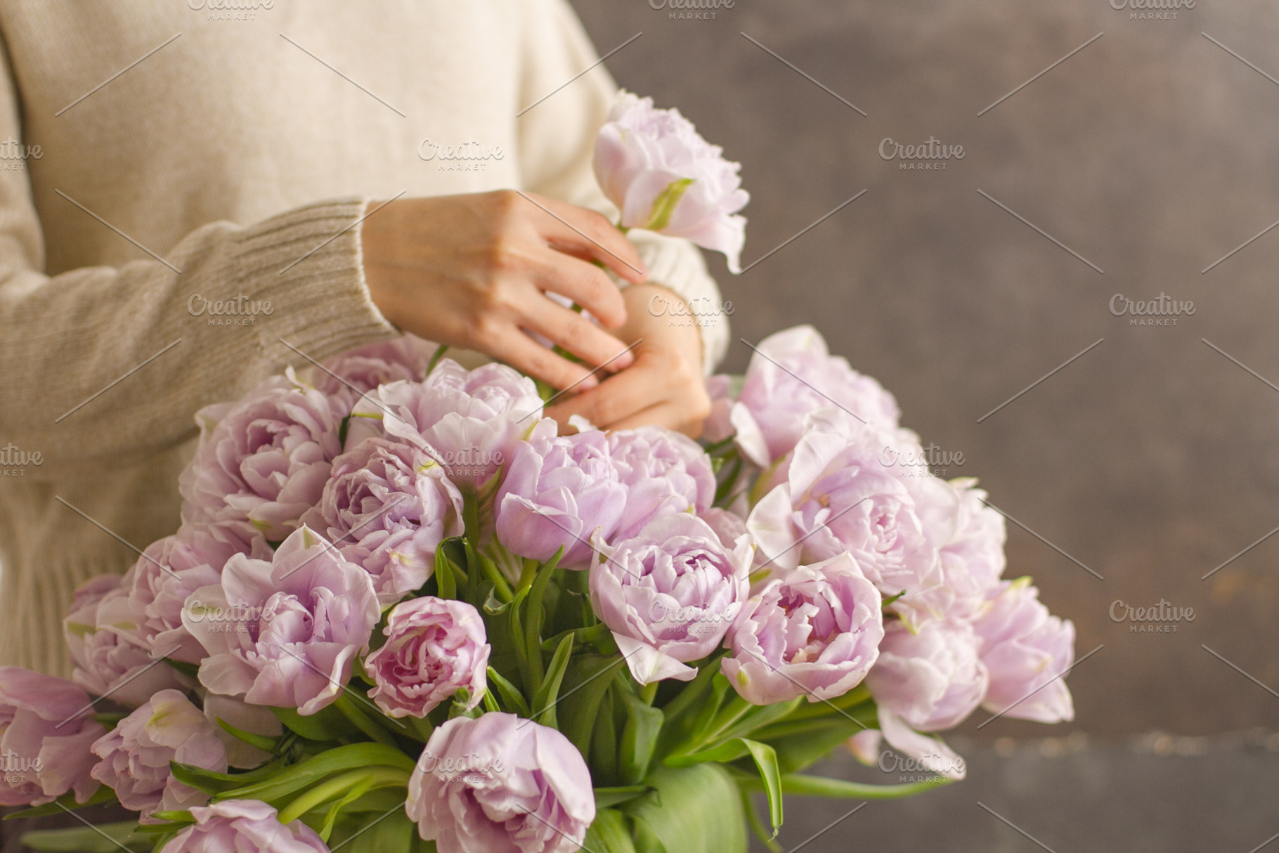 Florist at work: girl making bouquet, a Person Photo by Ira Paisley