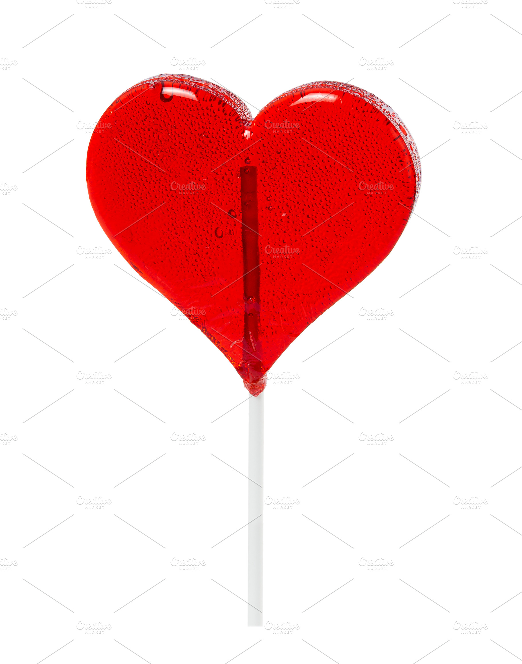 Lollipop in the shape of a heart featuring heart, lollipop, and candy, a Food & Drink Photo by Nataliia Pyzhova