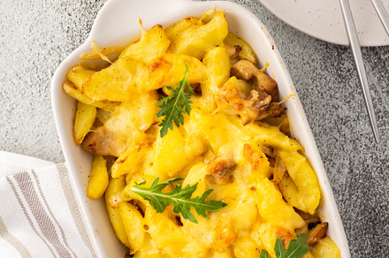 Stewed young potatoes with meat, a Food & Drink Photo by Pandateam