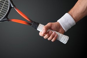 Tennis Player Gripping Racket Handle, a Sports & Recreation Photo by Davizro's Market