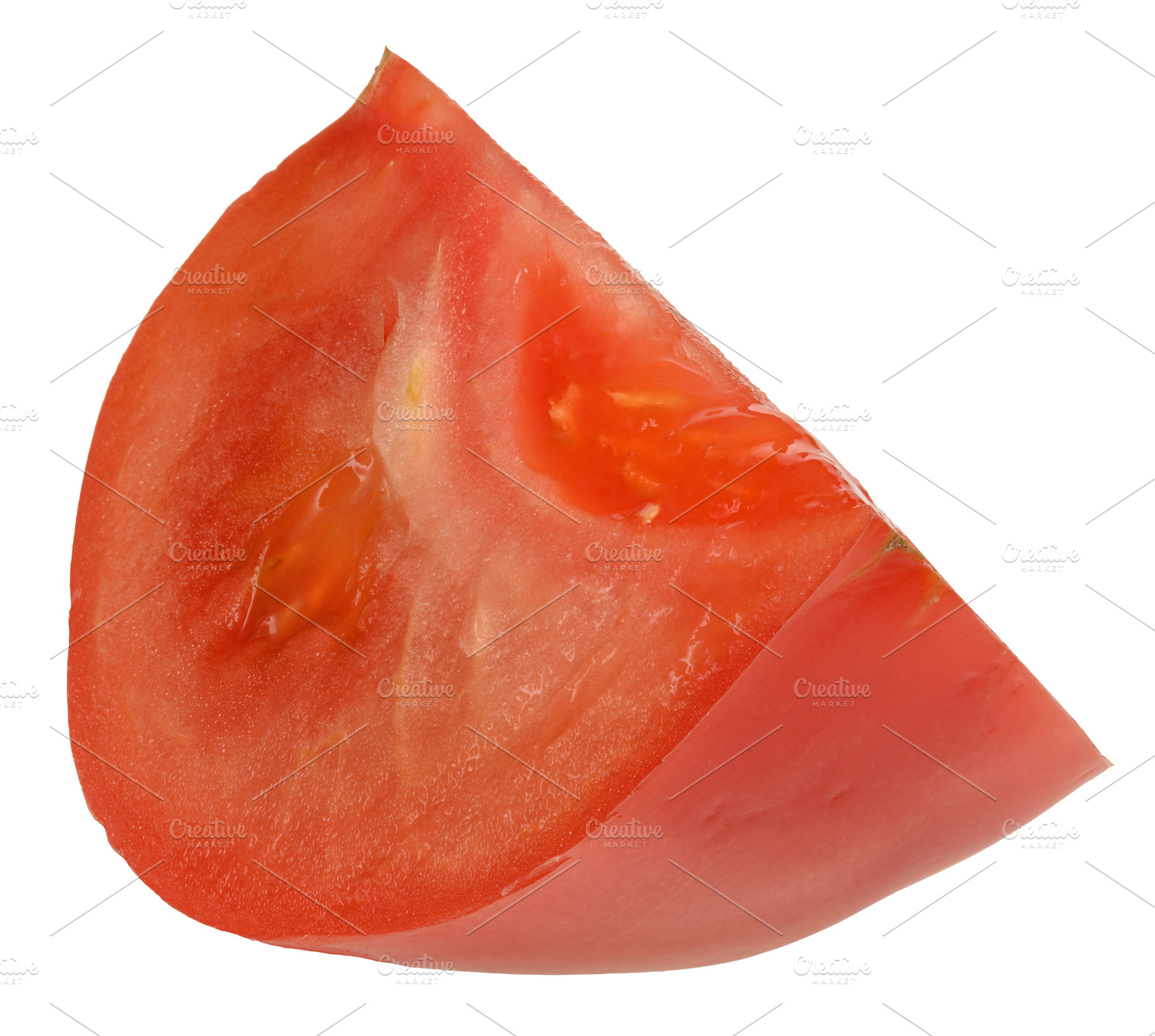 Juicy ripe slice of red tomato with seeds inside, isolated backg, a Food & Drink Photo by ndanko