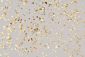 Golden confetti on grey background