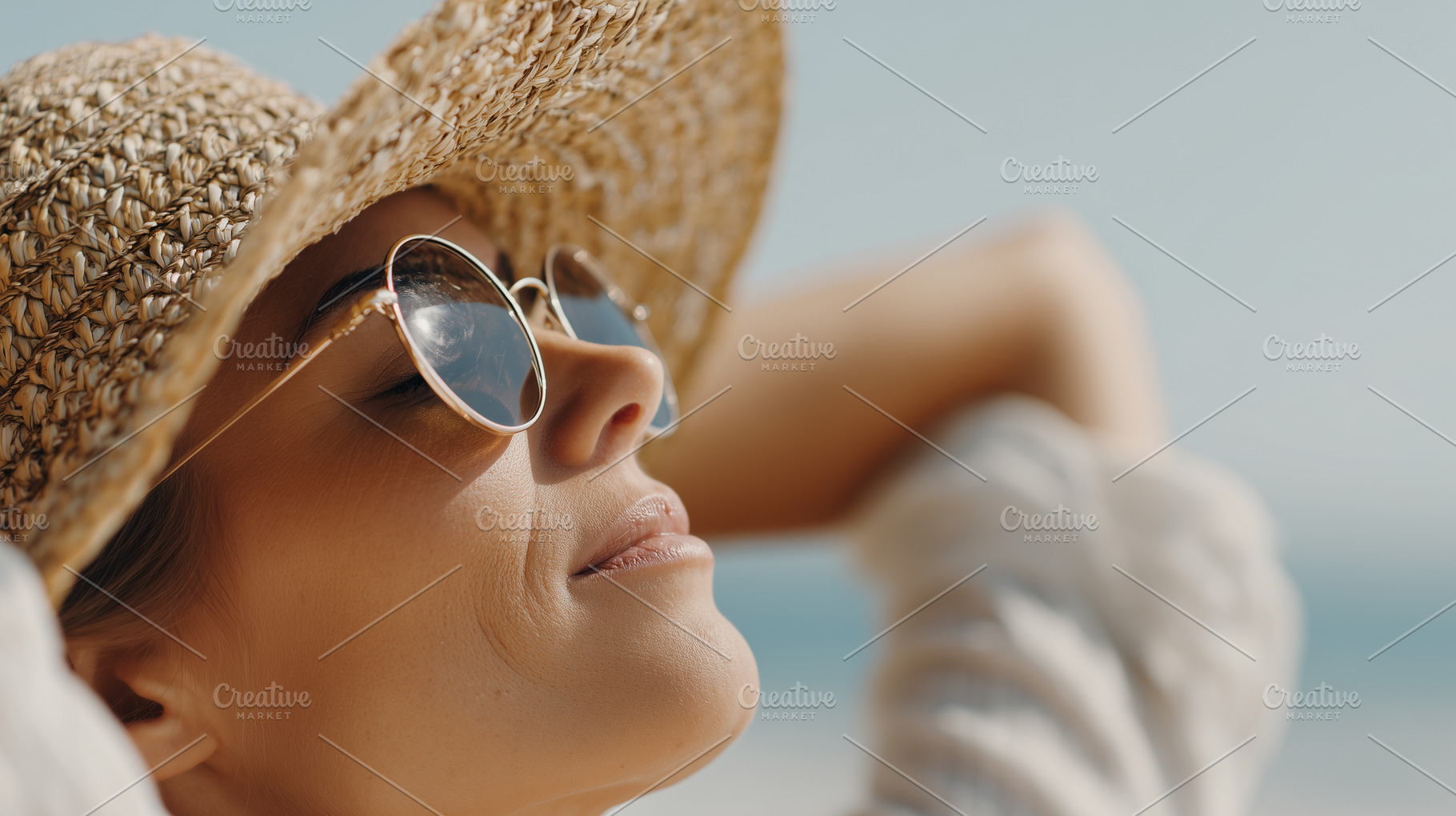 Woman in sunglasses and a straw hat, a Person Photo by MistyDay