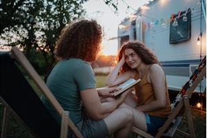 Couple having romantic camping trip, a Person Photo by HalfPoint