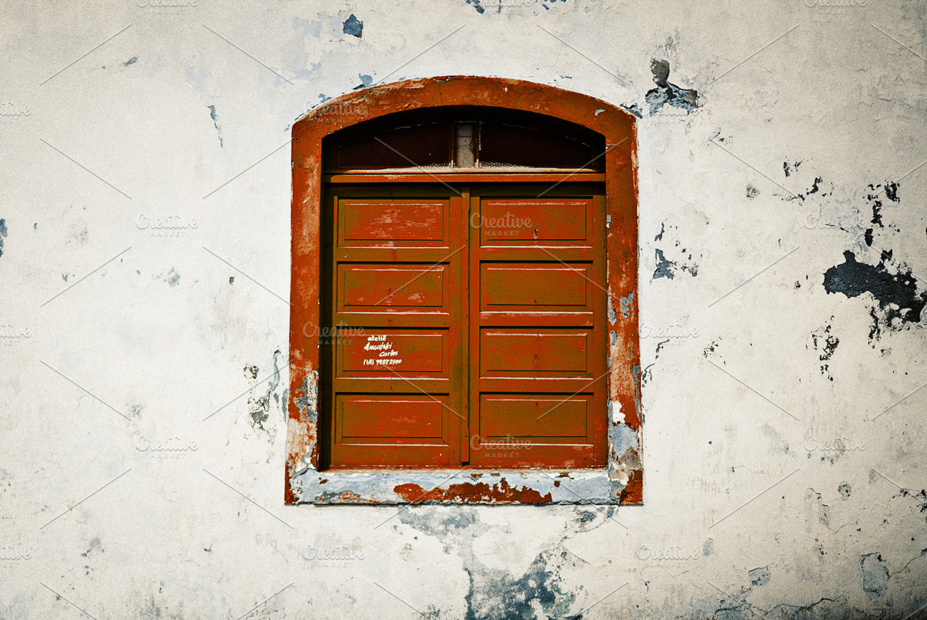 Old red window stock photo containing decay and decal, an Architecture Photo by André Bernardo