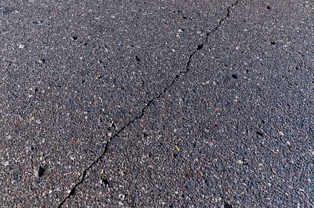 Close up of an asphalt road, a Photo by MyPhotos