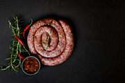 Raw beef sausages on a castiron pan  selective focus containing heap, a Food & Drink Photo by Wild Drago Shop (Thumbnail 2 of 2)