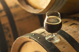 Barrel aged stout containing alcohol, ale, and barrel