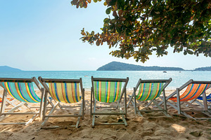 Line of colorful sun lounges