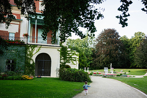Beautiful garden and historic building in Lancut, Poland with a peaceful ambian, a Photo by AS photostudio