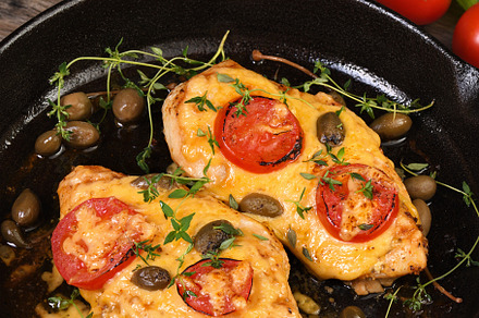 Chicken breast with cheese and tomat, a Food & Drink Photo by Apolonia