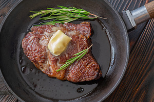 Pan seared ribeye steak with melting, a Food & Drink Photo by Alexander Prokopenko