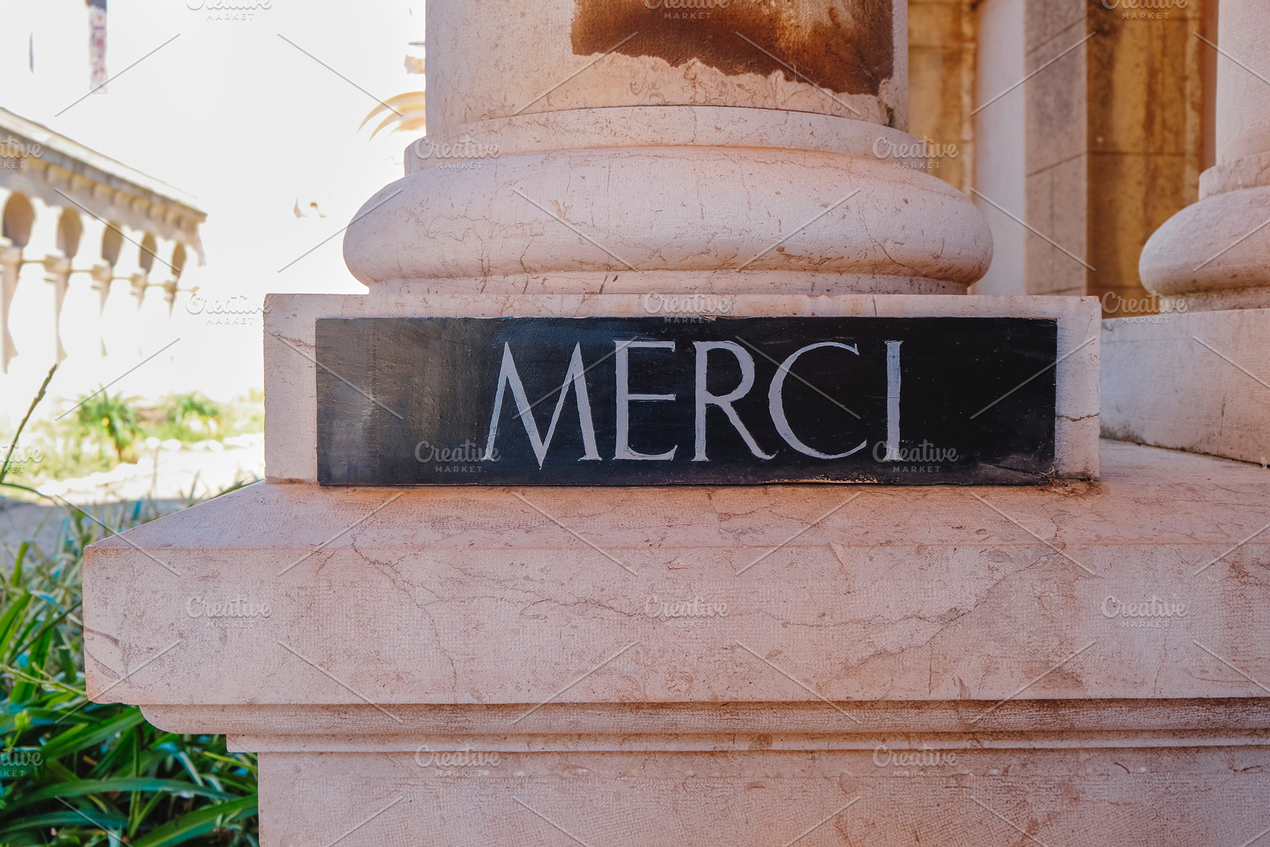 sign with the word merci at Lerins Abbey, France, a Photo by Nito