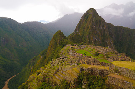 Aerial Panoramic view to Machu Picchu archaeological site and Huayna Picchu mou, an Architecture Photo by Wild, Wild World