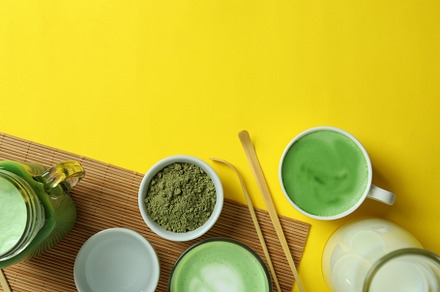 Matcha latte and accessories for making on yellow background, a Food & Drink Photo by AtlasStudio PRO