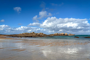 Granite reefs and shallow water along Tregastel Brittany France, a Nature Photo by GoodGoods