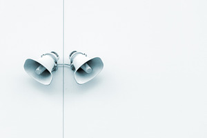 Pair of loudspeakers on the wall, a Technology Photo by BOOCYS