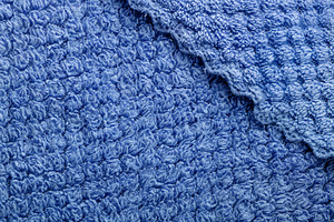 Close-up of soft blue towel fabric with rich texture, suitable f, a Background Photo by Ales Munt