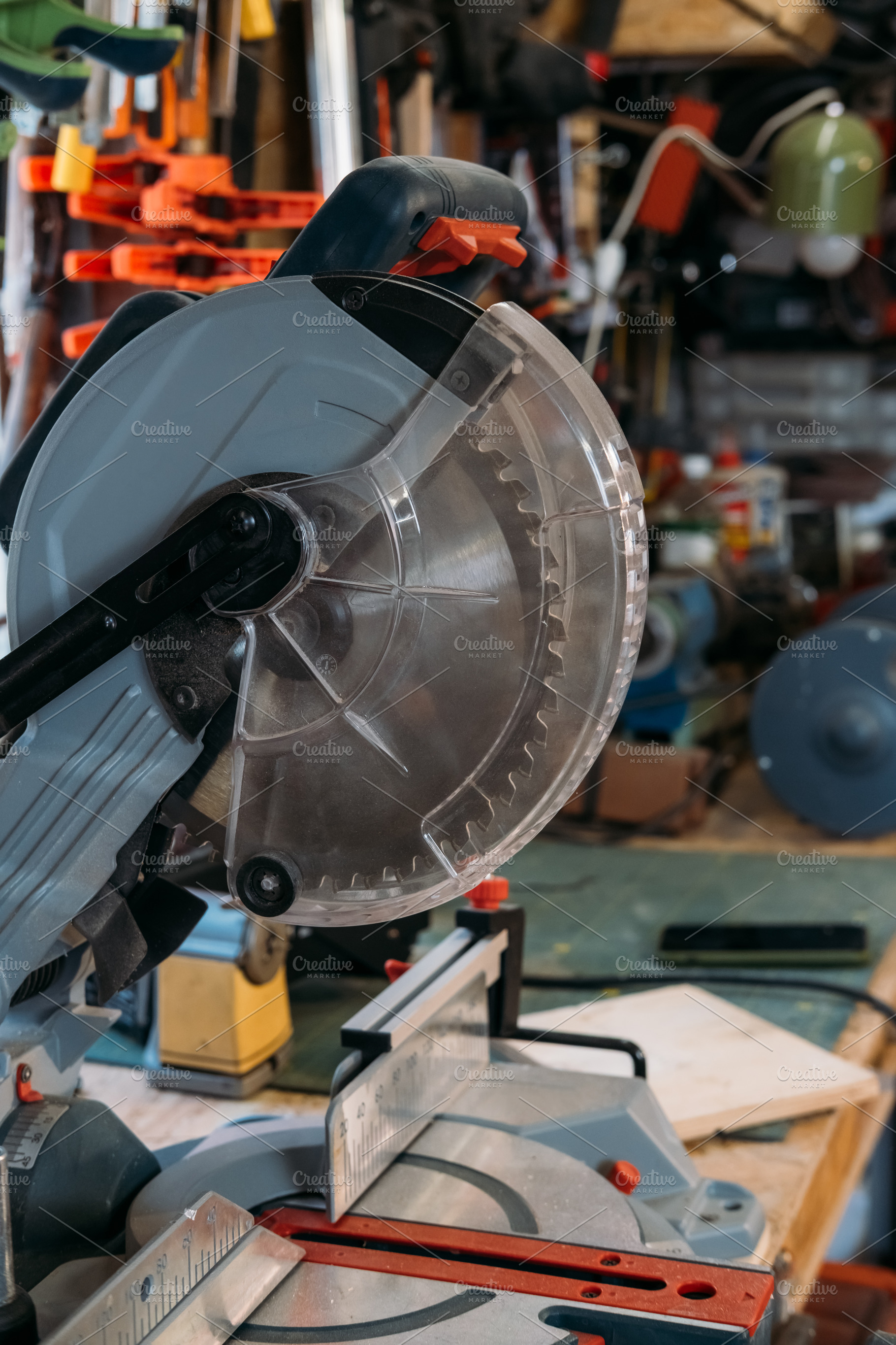 Miter saw circular blade sharp carpentry equipment, an Industrial Photo by Photo Drive Studio