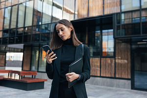 Confident and serious businesswoman, a Business Photo by Artem Varnitsin