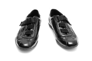 Black shoe isolated, a Photo by saiko3p