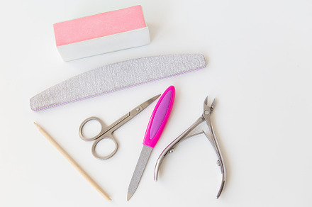 Professional manicure set on a white table. The concept of hand care, salon pro, a Beauty & Fashion Photo by Artsaba Family