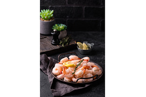 Frozen uncooked prawns or shrimps, a Food & Drink Photo by Yulia Furman