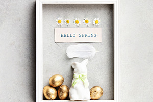 Hello Spring Easter Frame Mockup with Bunny and Golden Eggs, a Holiday Photo by Natalia Klenova's Shop